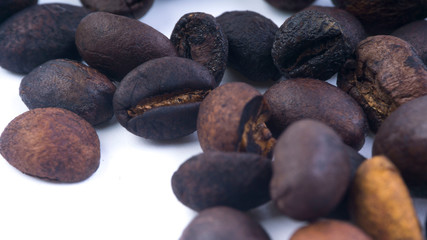 Coffee beans closeup with selective focus and crop fragment