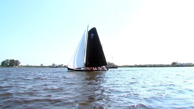 sailing with classic boats on inhore water Friesland The Netherlands