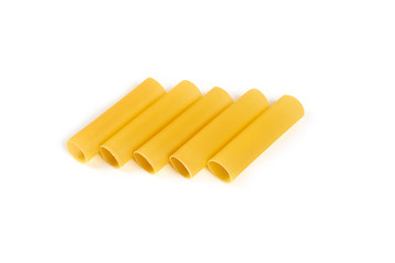 Italian cannelloni pasta tubes isolated over white background.