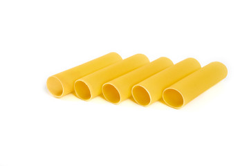 Italian cannelloni pasta tubes isolated over white background.