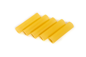 Italian cannelloni pasta tubes isolated over white background.