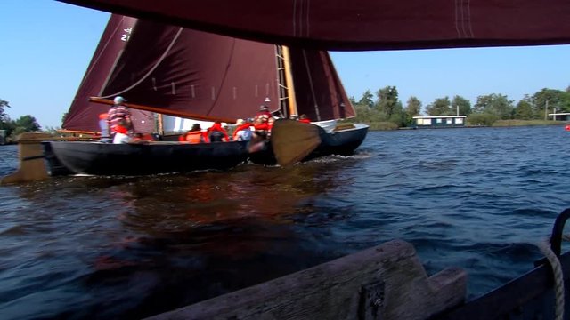 sailing with classic boats on inhore water Friesland The Netherlands