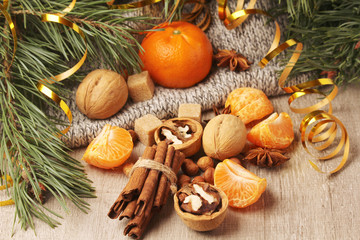 Still life composition formed with pine branches and New Year sweets