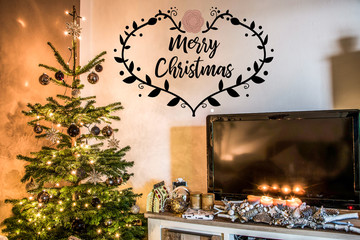 Merry Christmas beautiful living room tree setup aith gifts decorated at home textspace saying merry christmas