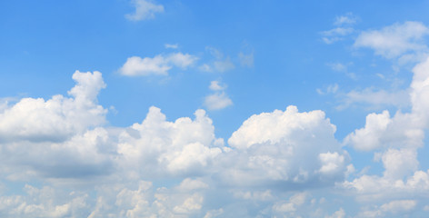 Naklejka na ściany i meble Puffy Cloud on the blue sky background. 