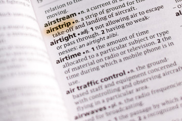The word or phrase Airstrip in a dictionary.