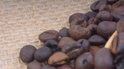 Coffee beans closeup with selective focus and crop fragment