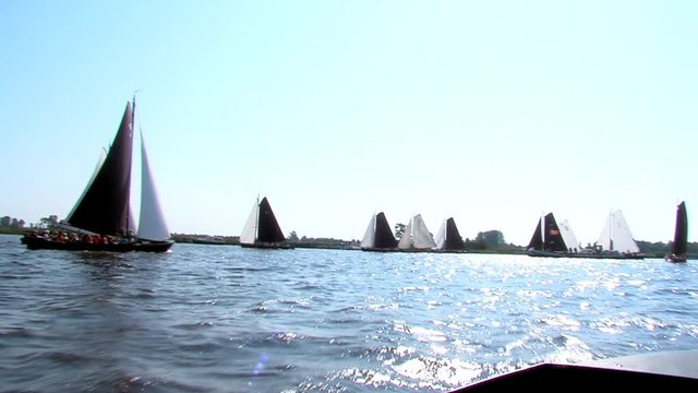 sailing with classic boats on inhore water Friesland The Netherlands