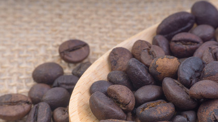 Coffee beans closeup with selective focus and crop fragment