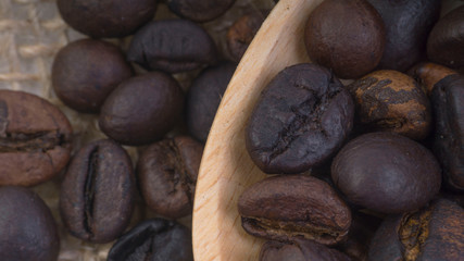 Coffee beans closeup with selective focus and crop fragment