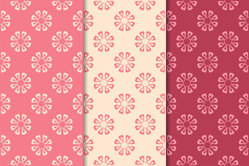 Fototapeta na wymiar Set of red floral ornaments. Cherry pink vertical seamless patterns