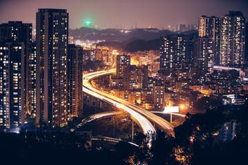 Fototapeta premium Moving car with blur light through city at night