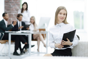 young business woman reading document in his office.