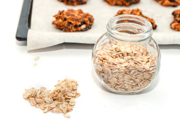 Homemade oatmeal cookies and oat flakes. Proper nutrition concept.