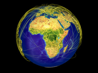 Africa from space on Earth with country borders and lines representing international communication, travel, connections.