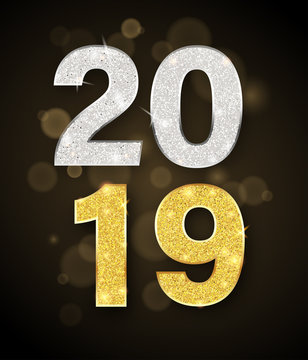 New Year 2019 sign with shiny figures on blurred background.