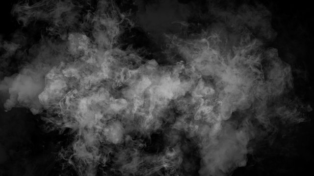 Abstract smoke mist fog on a black background. Texture. Design element. 