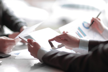 close up. the business team prepares a financial report.