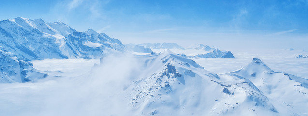 Fototapeta na wymiar Stunning Panoramic view snow mountain of the Swiss Skyline from Schilthorn Piz Gloria, Switzerland