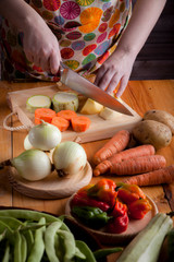 Ingredients to prepare vegan or vegetarian food, healthy food for vegan or vegetarian people, potatoes, carrots, onions, chili, beans, chives, zucchini, raw vegetables to prepare food