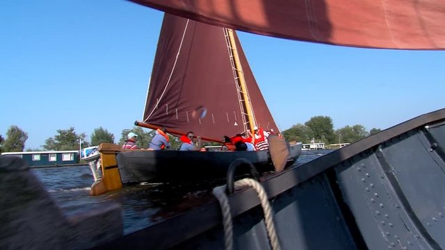 sailing with classic boats on inhore water Friesland The Netherlands