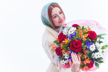 Woman with a flowers bouquet at winter, romantic concept, girl at date 
