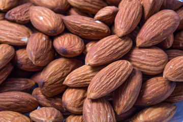 Almonds nuts background.