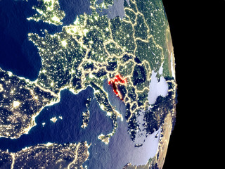 Satellite view of Croatia at night with visible bright city lights. Extremely fine detail of the plastic planet surface.