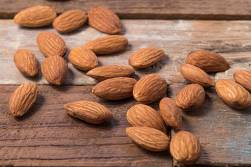 Almonds on a rustic wooden table