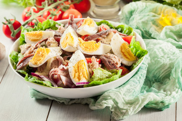 Nicoise Salad with tuna, anchovy, eggs and tomatoes