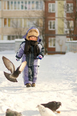 Boy enjoying the first snow