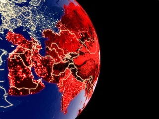 Satellite view of Asia at night with visible bright city lights. Extremely fine detail of the plastic planet surface.