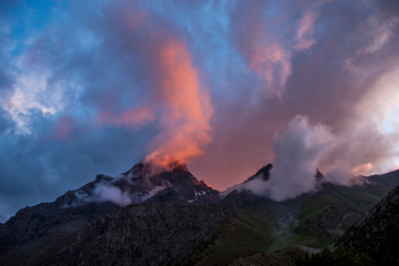 Colored clouds in mountains