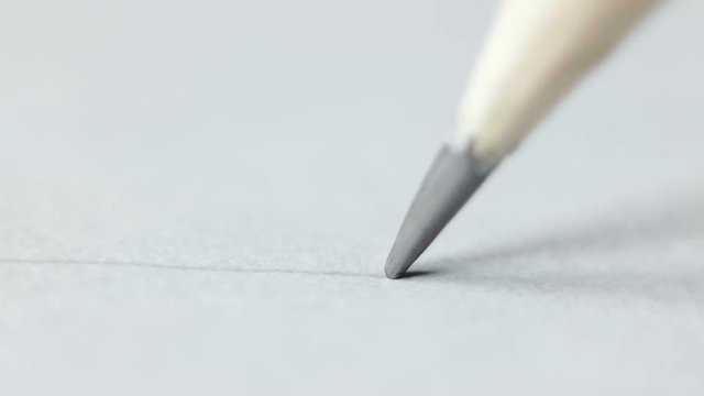 Write or draw with pencil on paper