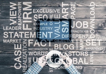 Close view of woman in checked shirt at her workplace