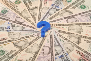 Question mark on mandala kaleidoscope from money.