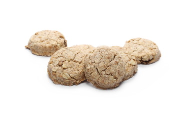 Integral round oatmeal cookies with raisins isolated on white background