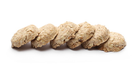 Integral round oatmeal cookies with raisins isolated on white background