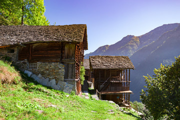 Typical houses of the Walser community in a high mountain pasture in Valsesia in Piedmont, Italy.