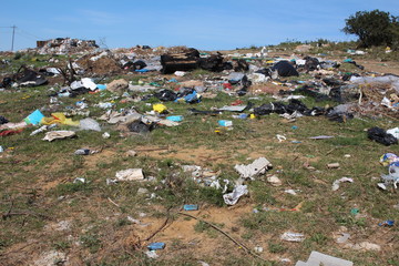 An illegal garbage dumpsite up close.