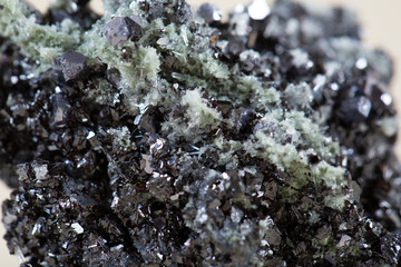 Pyrite on white background, also known as iron pyrite and fools gold