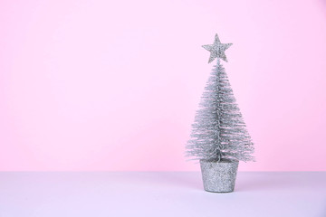 Christmas tree over pink background.