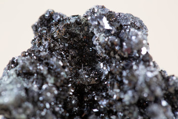 Pyrite on white background, also known as iron pyrite and fools gold