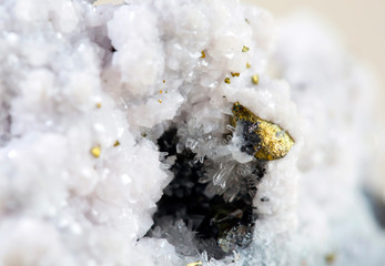 Pyrite on white background, also known as iron pyrite and fools gold