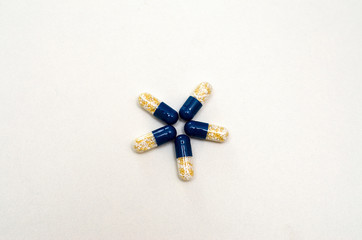 tablets painkiller prescribed by a doctor lie on a light background