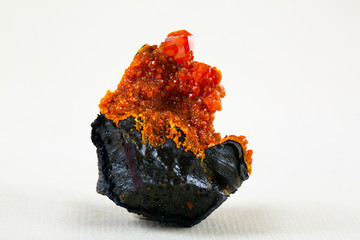 A rich jumble of tabular, reddish-orange wulfenite crystals. Mineral specimen wulfenite crystals...