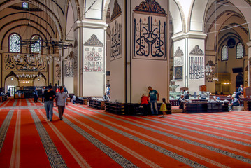 Bursa, Turkey, 30 April 2012: Ottoman Calligraphy, Ulu Mosque or Grand Mosque built in the Seljuk style, it was ordered by the Ottoman Sultan Bayezid I and built between 1396 and 1399. © Kayihan