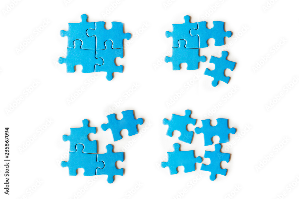 Wall mural Blue puzzles on white background. Set of blue puzzles. Isolated on white. Business and education