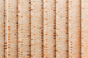 Abstract background from brown brick wall decorated on building.
