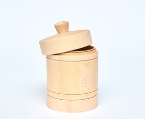 Herbal honey wooden jar. container for storing honey. insulator on white background. barrel place for text.